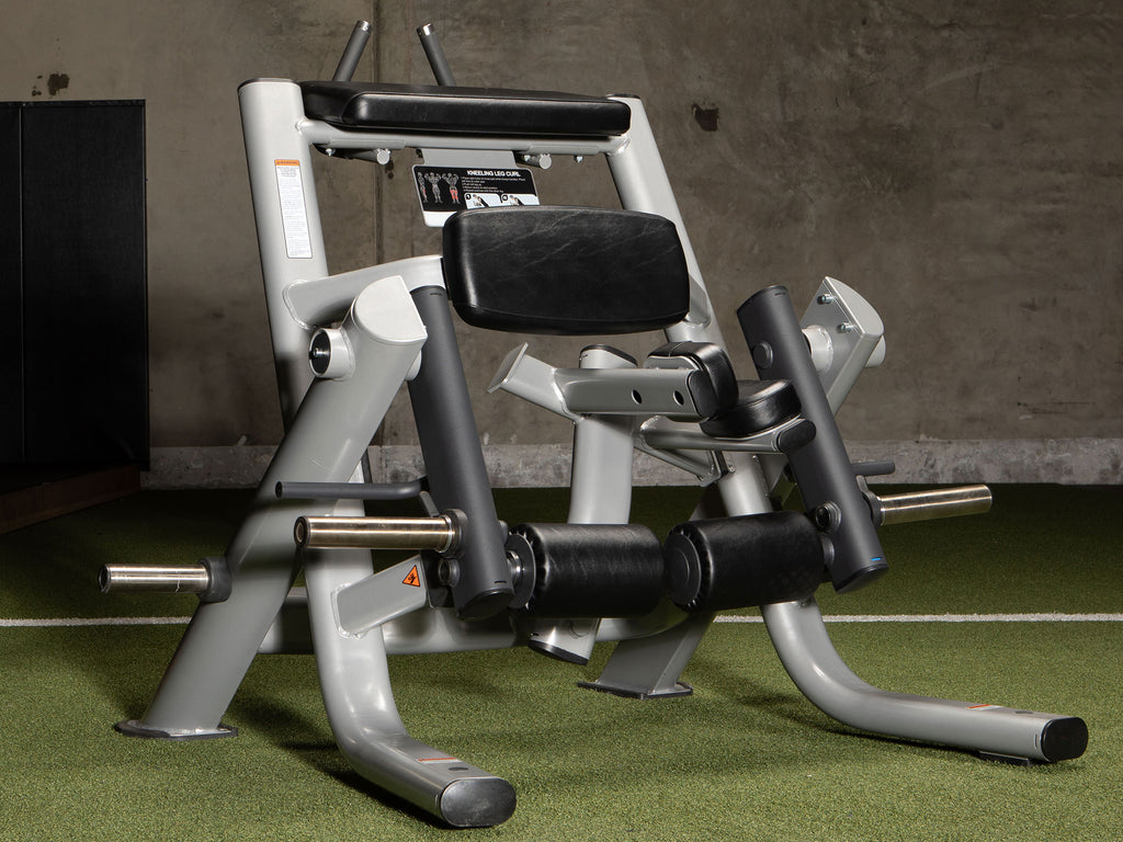 Sportgear Plate Loaded Kneeling Leg Curl in the Global Fitness Gym - Left