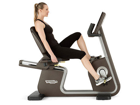 Factory photo of a Used Technogym ARTIS Recumbent Bike with Unity Display