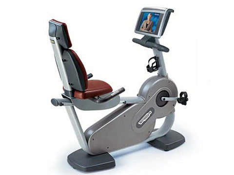 Factory photo of a Used Technogym Excite Recline 700iP Recumbent Bike with Wellness TV