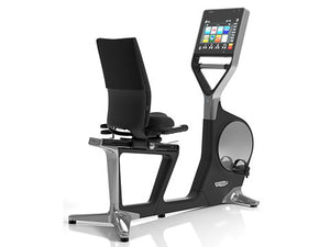 Factory photo of a Refurbished Technogym Recline Personal Recumbent Bike with Unity Display