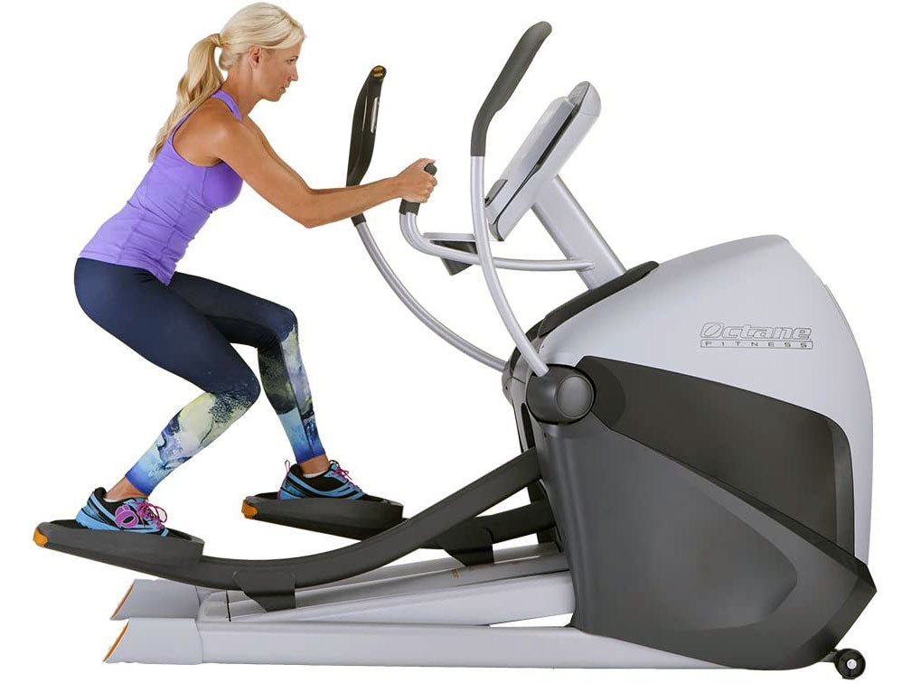 Used Octane Fitness XT4700 Front Drive Elliptical With Rider Side View